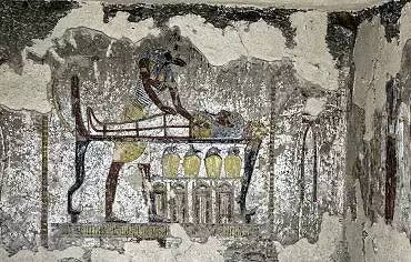 Illustration de Anubis et les quatre canopes sous la momie du roi