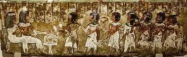 Illustration de Minhotep et son épouse (un cône parfumé sur leur tête) reçoivent des offrandes