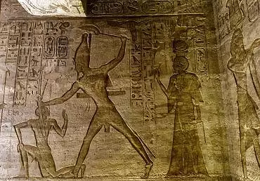 Illustration de Ramsès massacre un Nubien devant la reine Nefertari