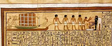 Illustration de le cercueil est transporté sur une barque ; la procession conduit à la chapelle funéraire où est pratiqué le rituel de l'"ouverture de la bouche" grâce auquel la momie est "régénérée".