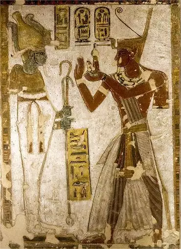 Illustration de le roi coiffé de la couronne de Basse-Egypte offre la Maât à Osiris qui tient une canne et le sceptre héqa